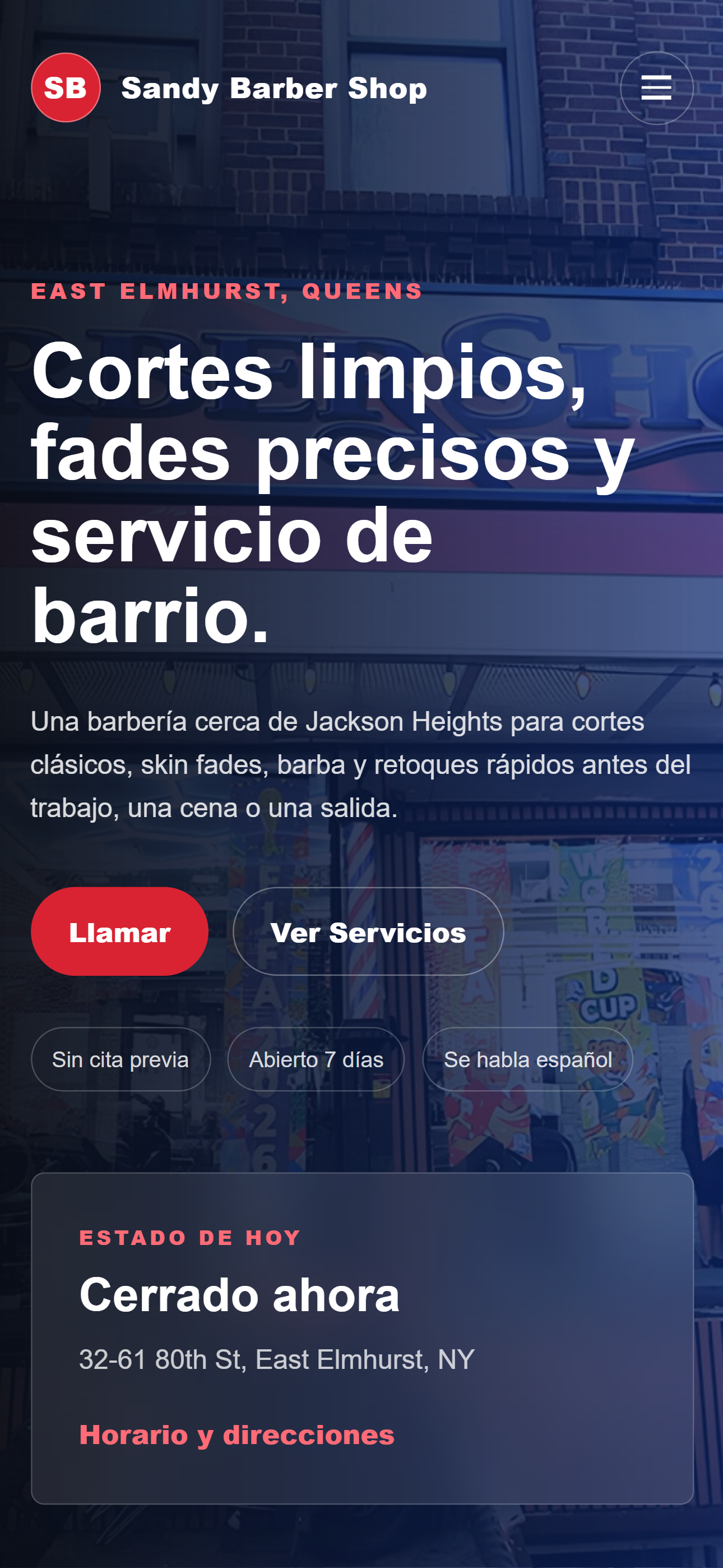 Mobile Sandy Barber Shop homepage showing the Spanish interface